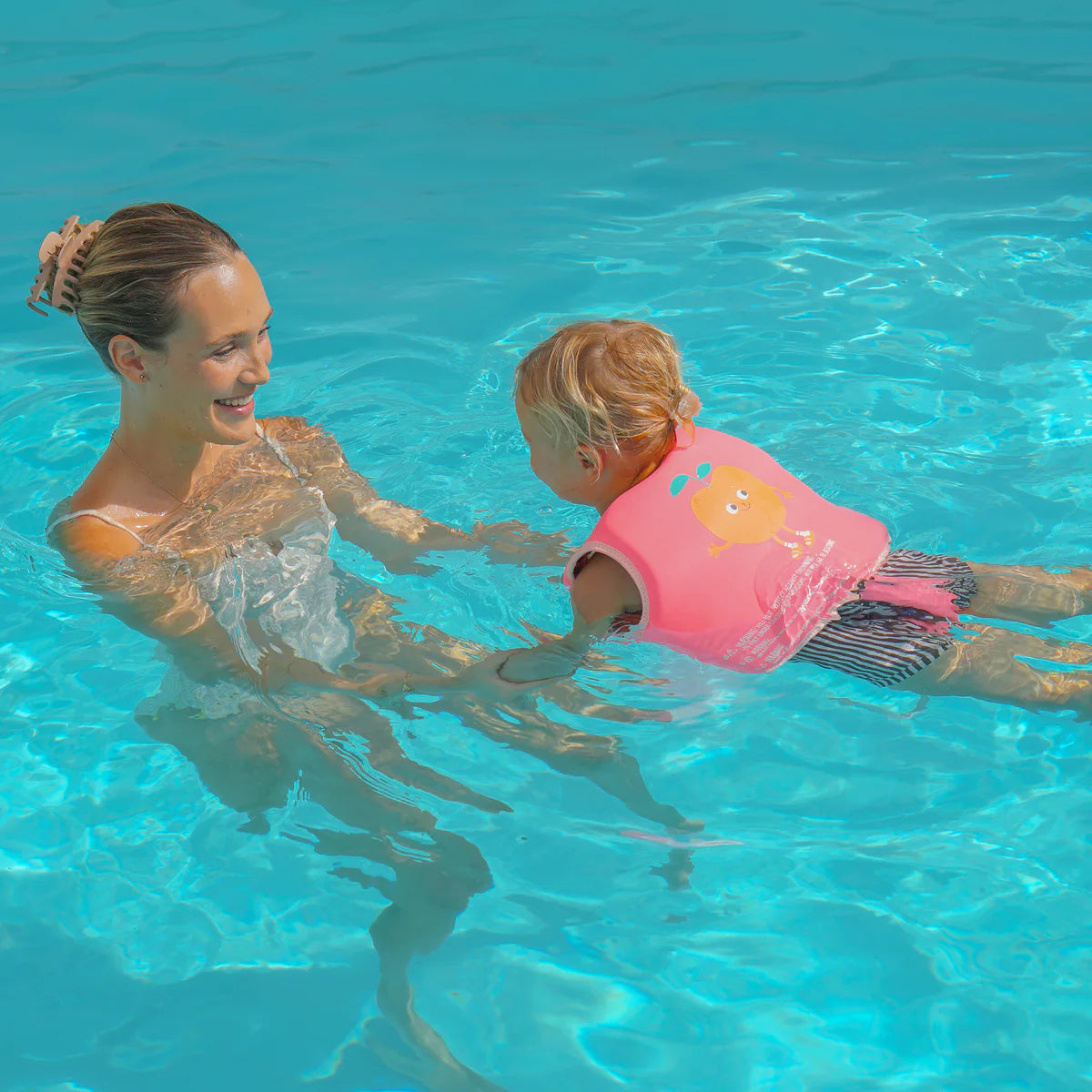 Chaleco flotador infantil Sunnylife Poppy the peach rosa